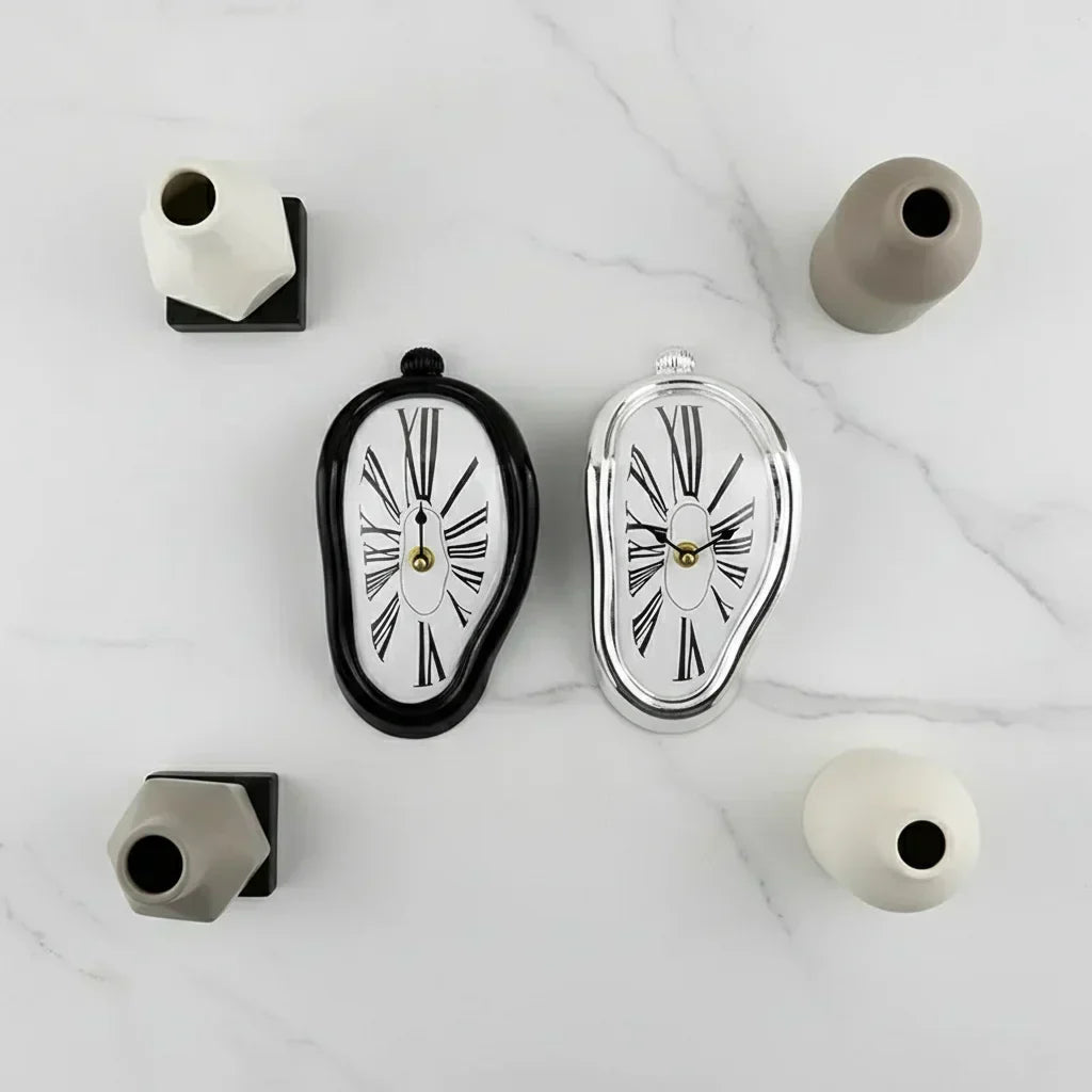 Horloges fondues noires decoration murale originale